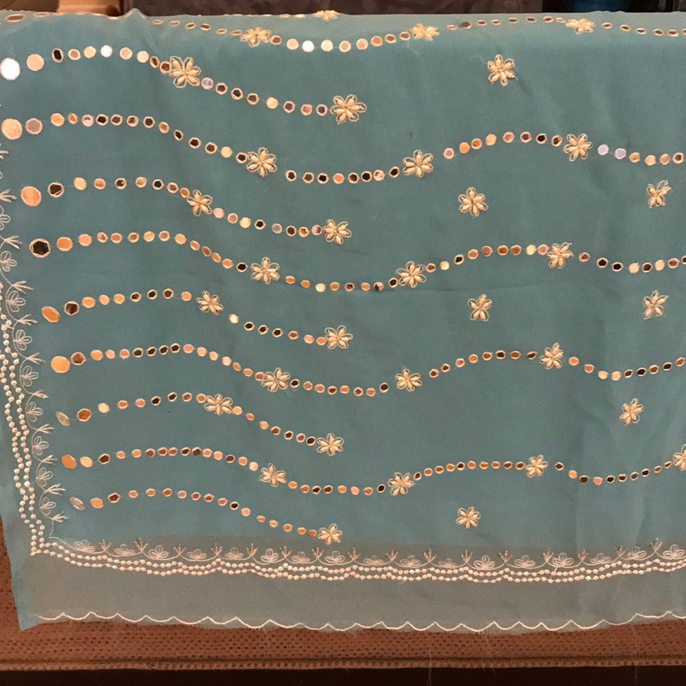 Lovely sky blue sari with mirror work